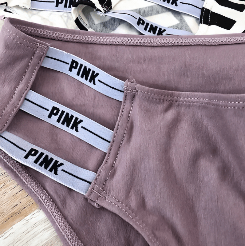 Stylish low-rise women's briefs with side stripes and letter pattern, perfect for active wear and everyday comfort.
